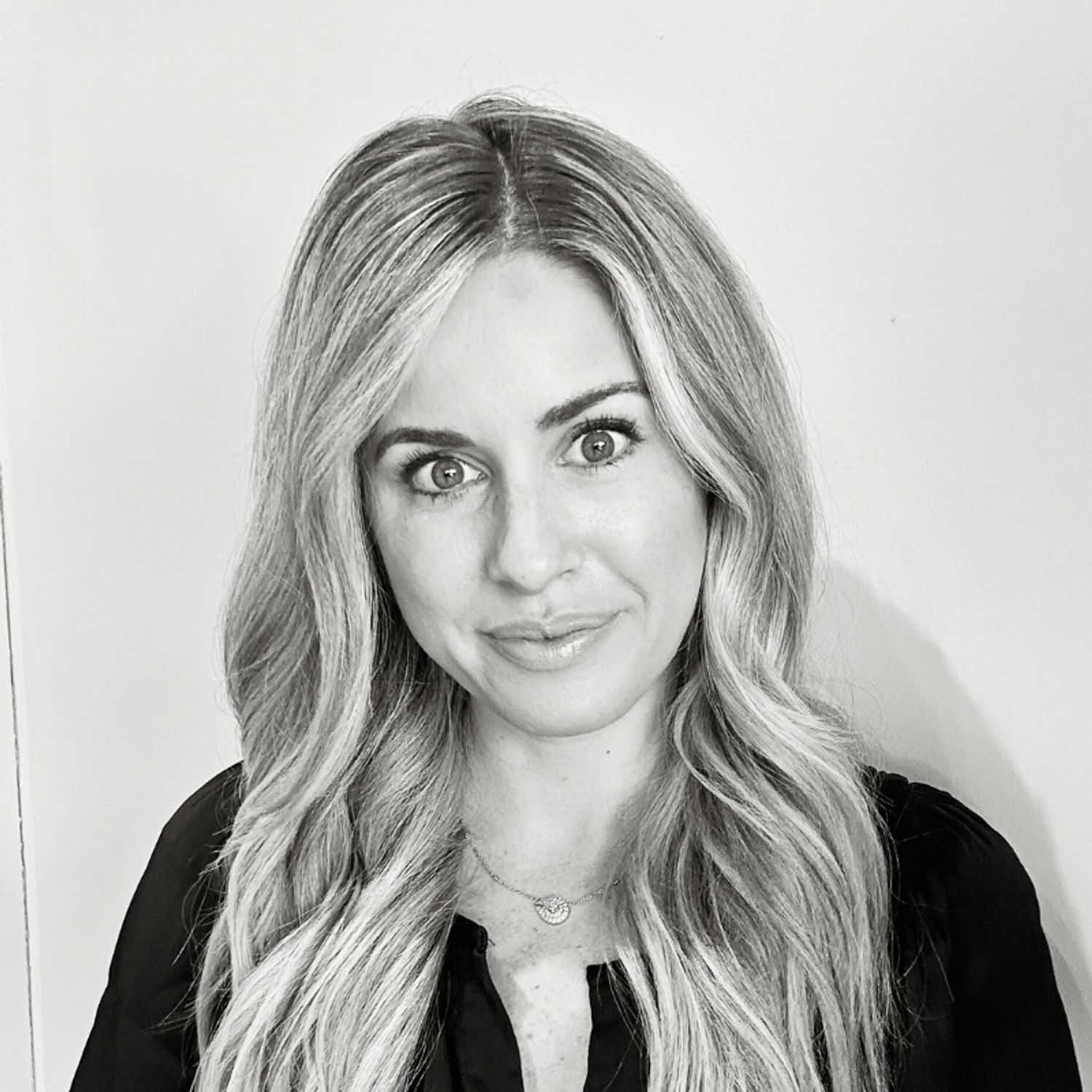 Portrait of Sarah, a professional stylist at Lux Salon, showcasing their expertise and style.