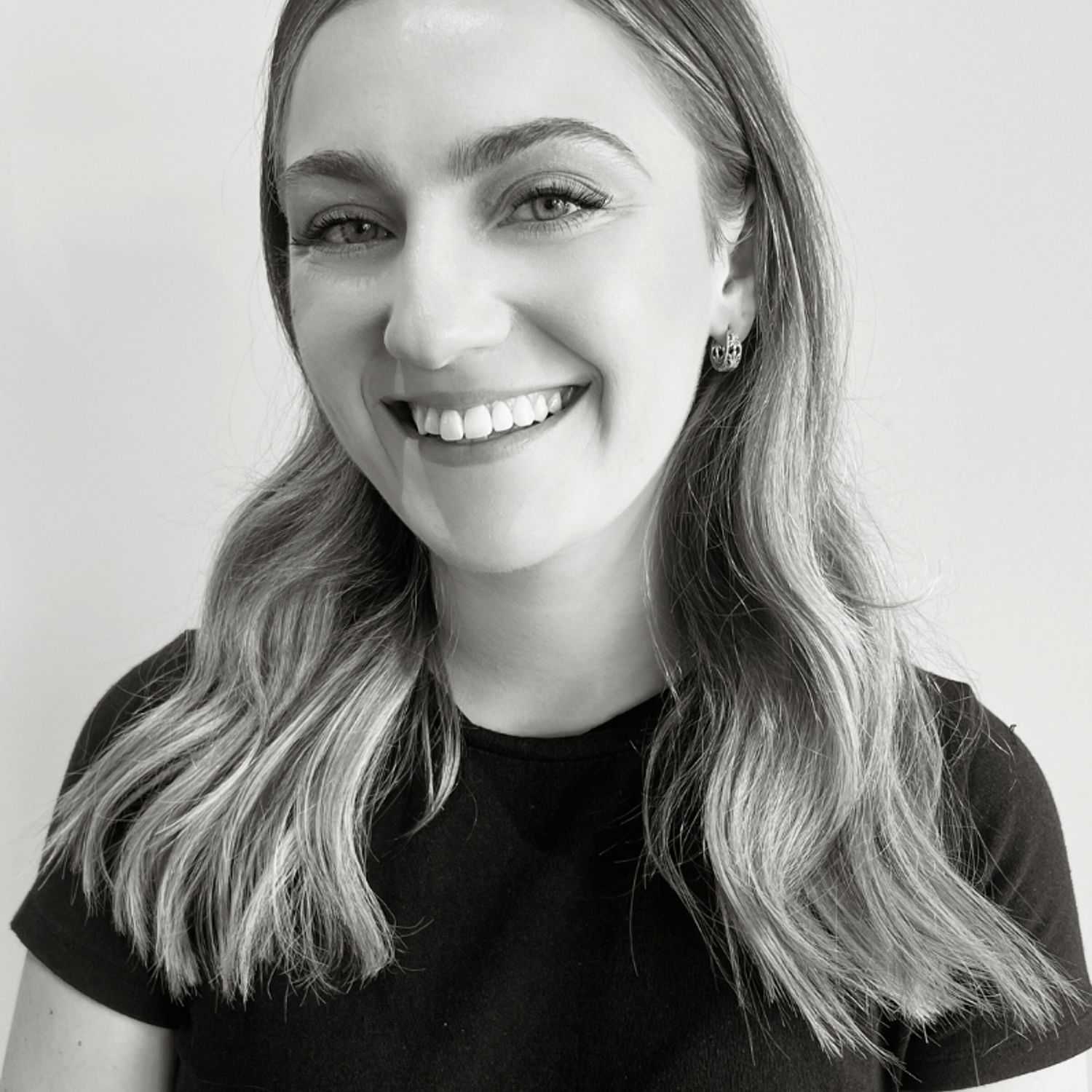 Portrait of Angie, a professional stylist at Lux Salon, showcasing their expertise and style.