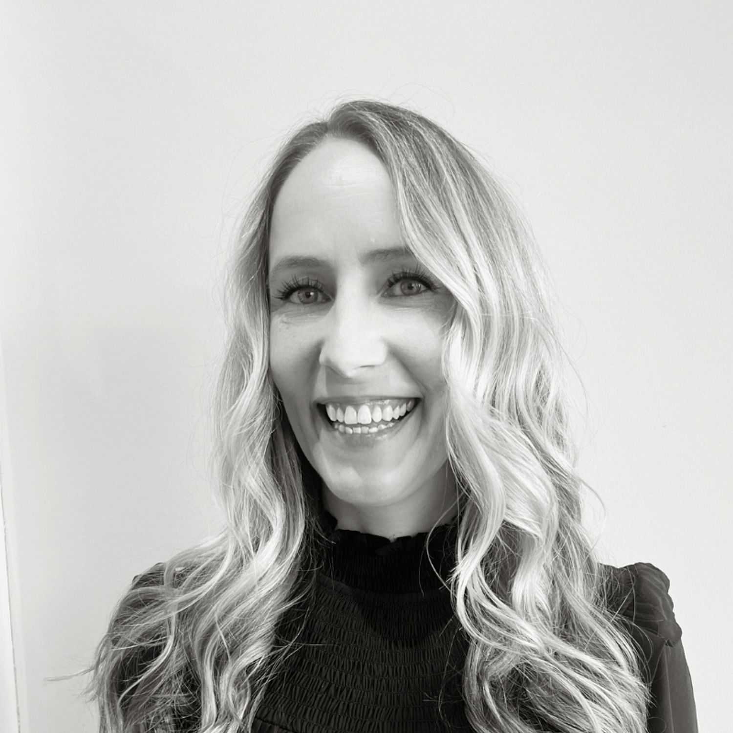 Portrait of Amanda, a professional stylist at Lux Salon, showcasing their expertise and style.