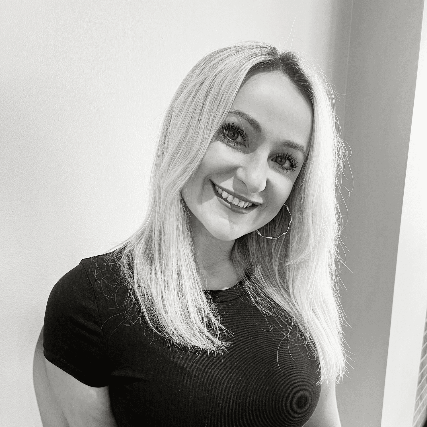 Portrait of Margo, a professional stylist at Lux Salon, showcasing their expertise and style.